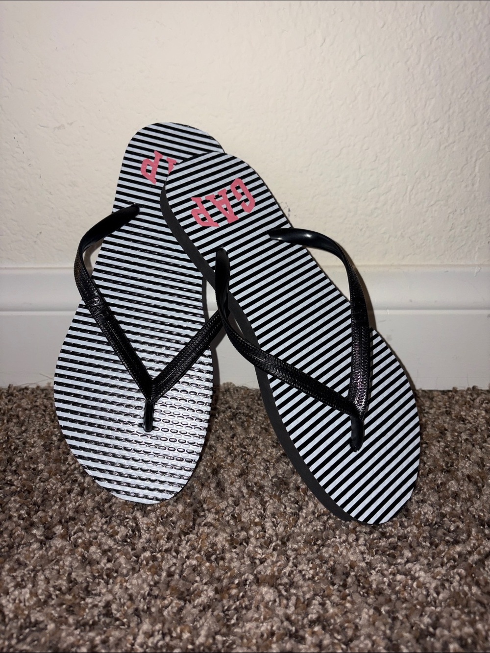 GAP Black and White Striped Flip Flops with Pink Logo